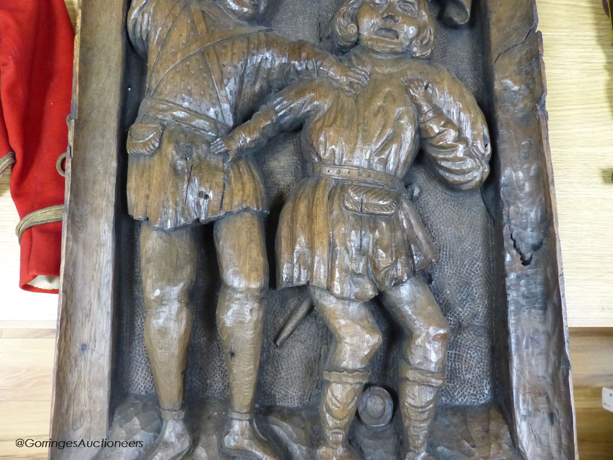 A 16th / 17th century carved oak panel